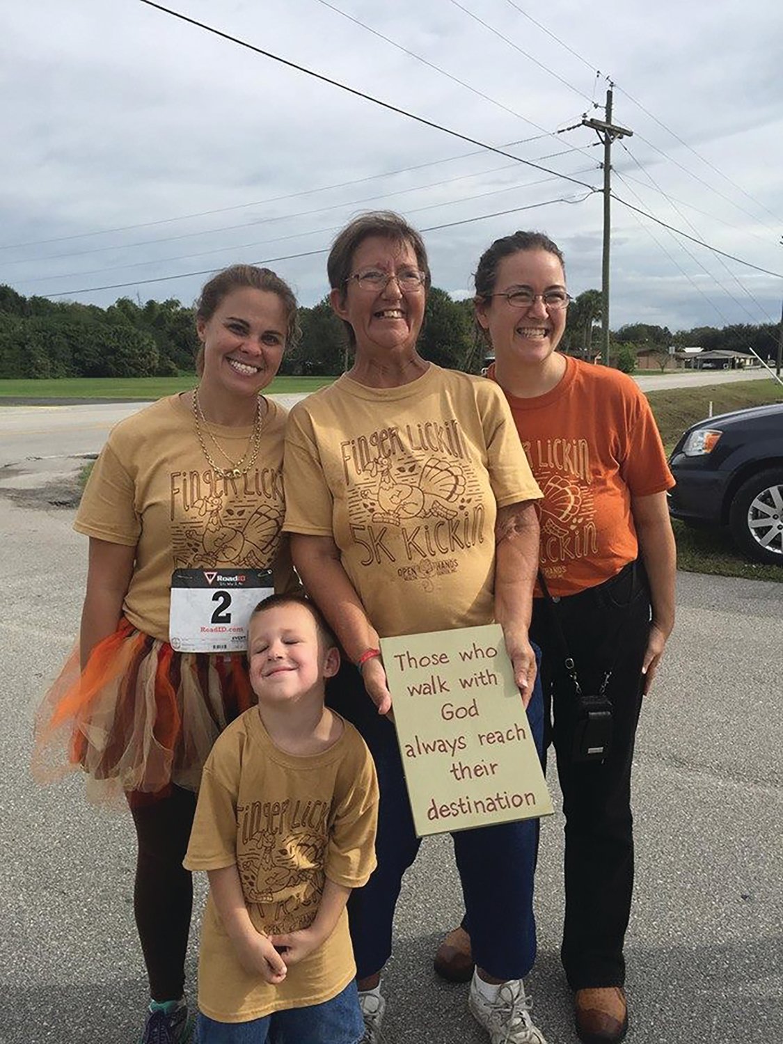 Tyna Futch (center) walked the 2016 Open Hands 5K just three months after coming out of a coma. She is pictured with Open Hands’ founder Nicole Talley (left), physician’s assistant Stacie Pasquarella and Ryan, one of Futch’s grandsons.